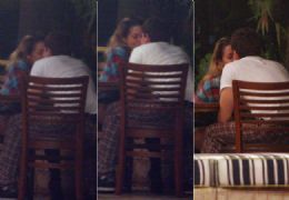 Danielle Winits e Jonatas Faro trocam beijos em restaurante