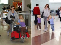 Fernanda Lima circula em aeroporto com os filhos gmeos