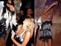 Paris Hilton perde a linha e mostra o seio em festa