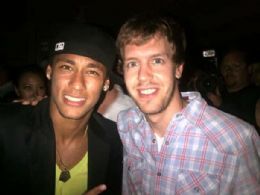 Em festa de patrocinador, Neymar posa para foto com Sebastian Vettel