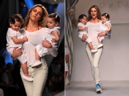 Fernanda Lima desfila com bebs no colo em So Paulo