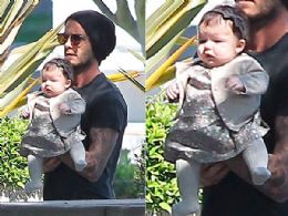 David Beckham passeia com a filha - fofssima - sem se importar com os paparazzi