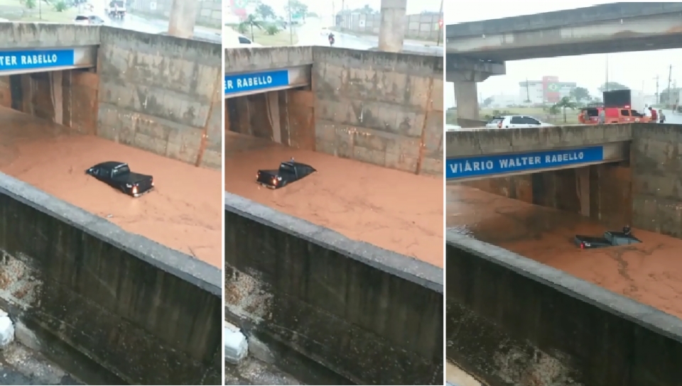 Caminhonete fica ilhada no Viaduto do Tijucal aps forte chuva e motorista  resgatado; veja vdeo