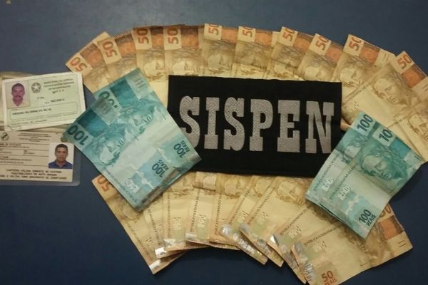Homem  preso ao tentar entrar em penitenciria com R$ 1,4 mil