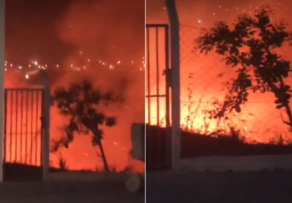 Bombeiros combatem incndio em vegetao de faculdade