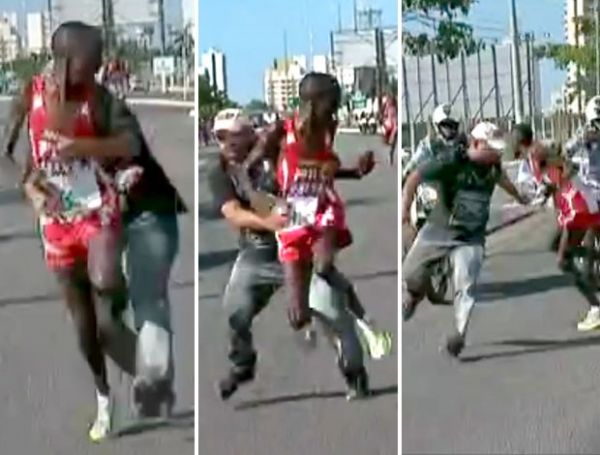Atleta queniano  agarrado durante prova, mas vence a Corrida de Reis