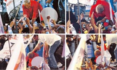 Militante derruba Lula durante comcio em Salvador