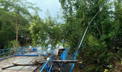 OD - Chuva atingiu Diamantino nesta madrugada deixa ponte submersa, casas alagadas e abre cratera no asfalto 1