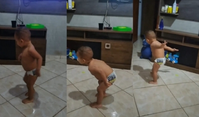 Beb cuiabano faz dancinha do pombo e surpreende famlia durante jogo da Seleo